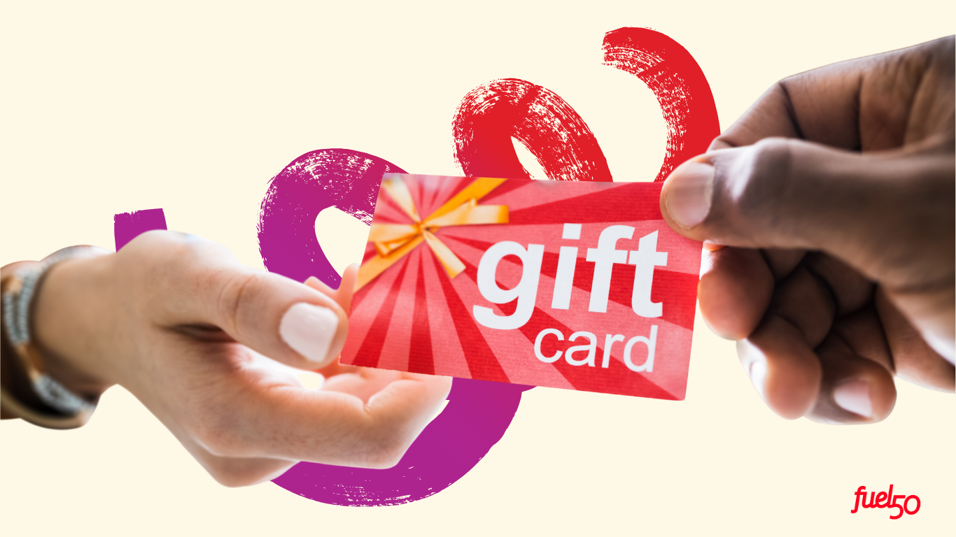 hands holding a gift card hands holding a gift card